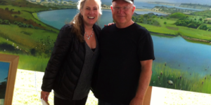 Susan Bush and artist Hank Pitcher at a UCSB alumni event.