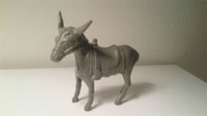 Sally of Santa Barbara's cast iron donkey bank by A. C. Williams Co. from 1910-34 could have been worth up to $250, but because it's not the original paint, it's priced more around $50 to $75.